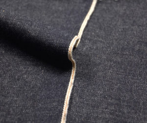 What’s difference between unsanforized selvedge denim and raw selvedge denim fabric?