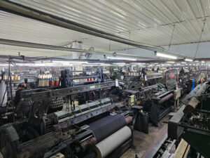 Shuttle looms manufacturing selvedge denim in WingFly Textile factory