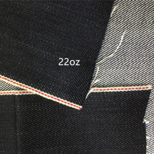 Heavyweight selvedge denim fabric texture with red line selvedge edge 22oz Heavyweight selvedge denim fabric texture with red line selvedge edge